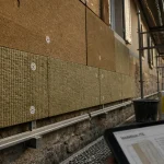 Meilleur isolant exterieur ITE : panneaux fibre de bois et laine de roche sur façade